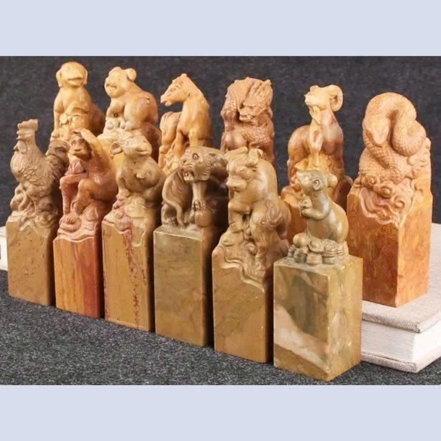 Set of stone seals topped with the twelve zodiac animals