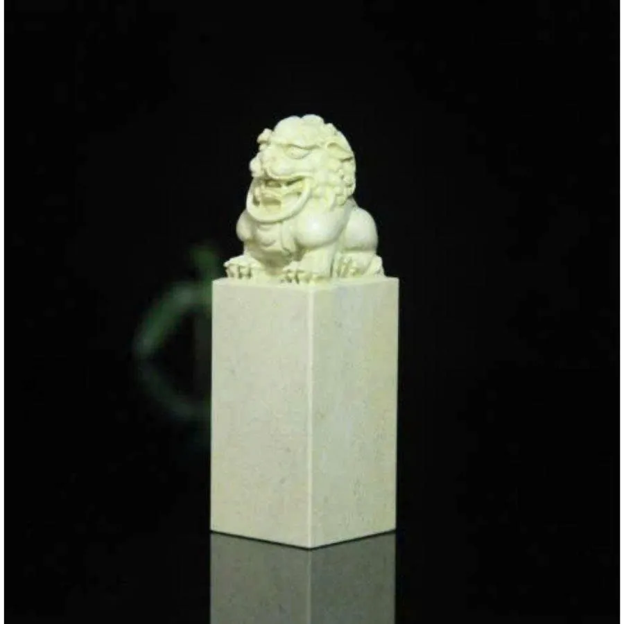 Stone seal with a guardian lion handle on black