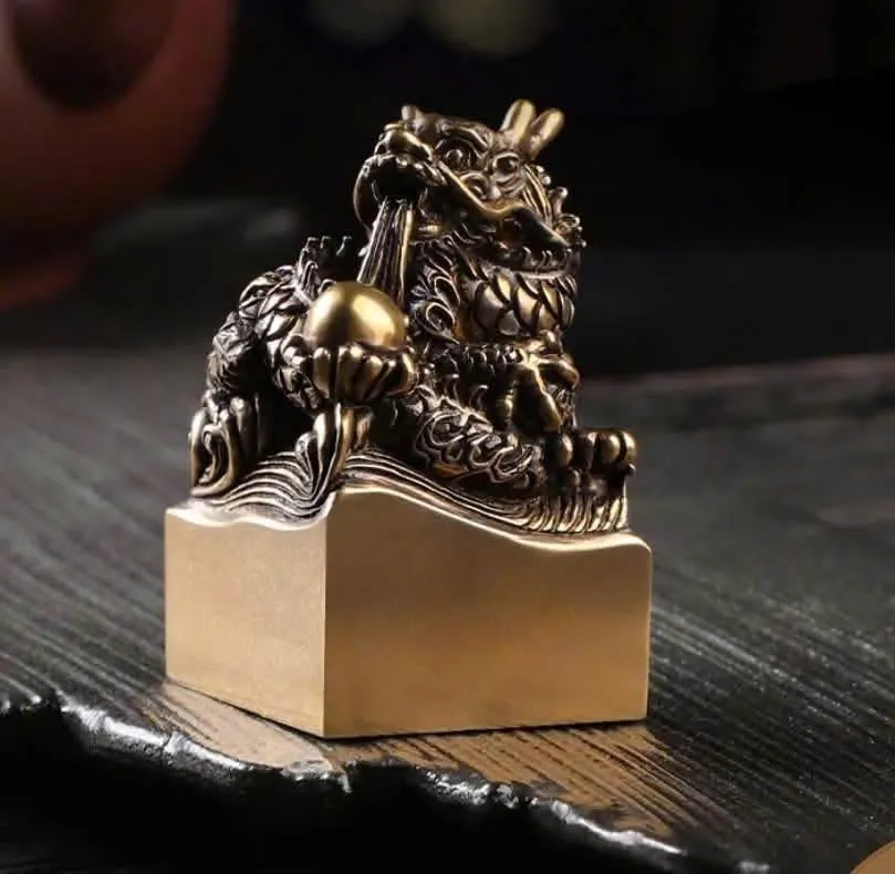 Bronze seal with a dragon holding a pearl
